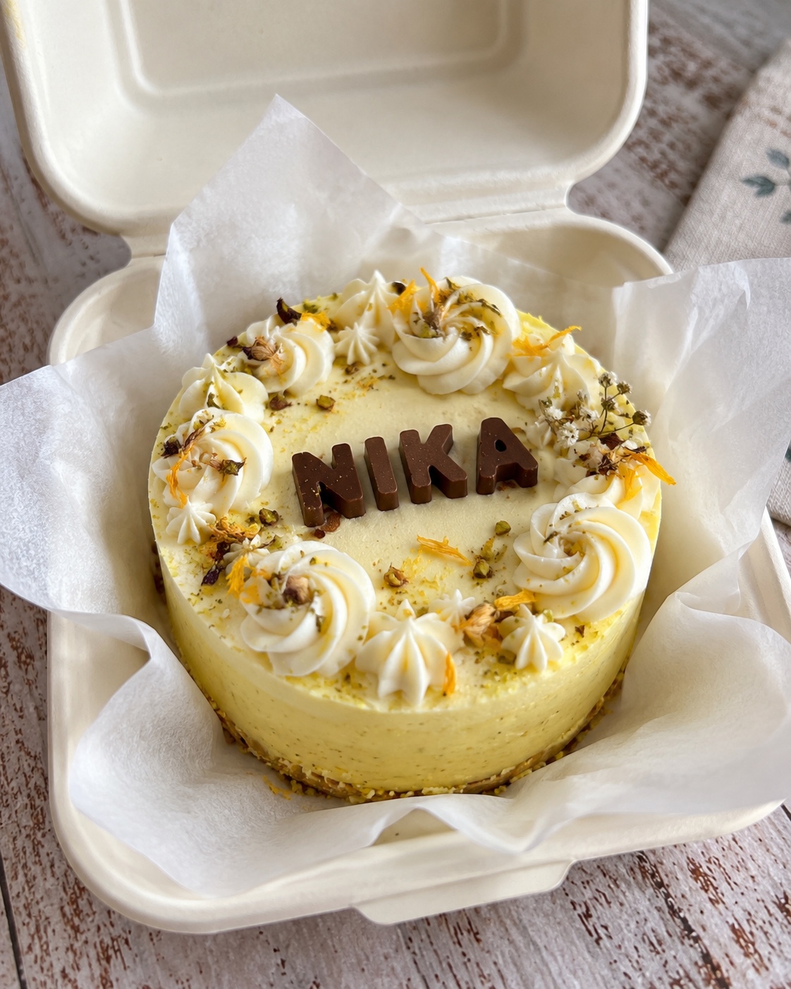 Lemon bento cake with white frosting